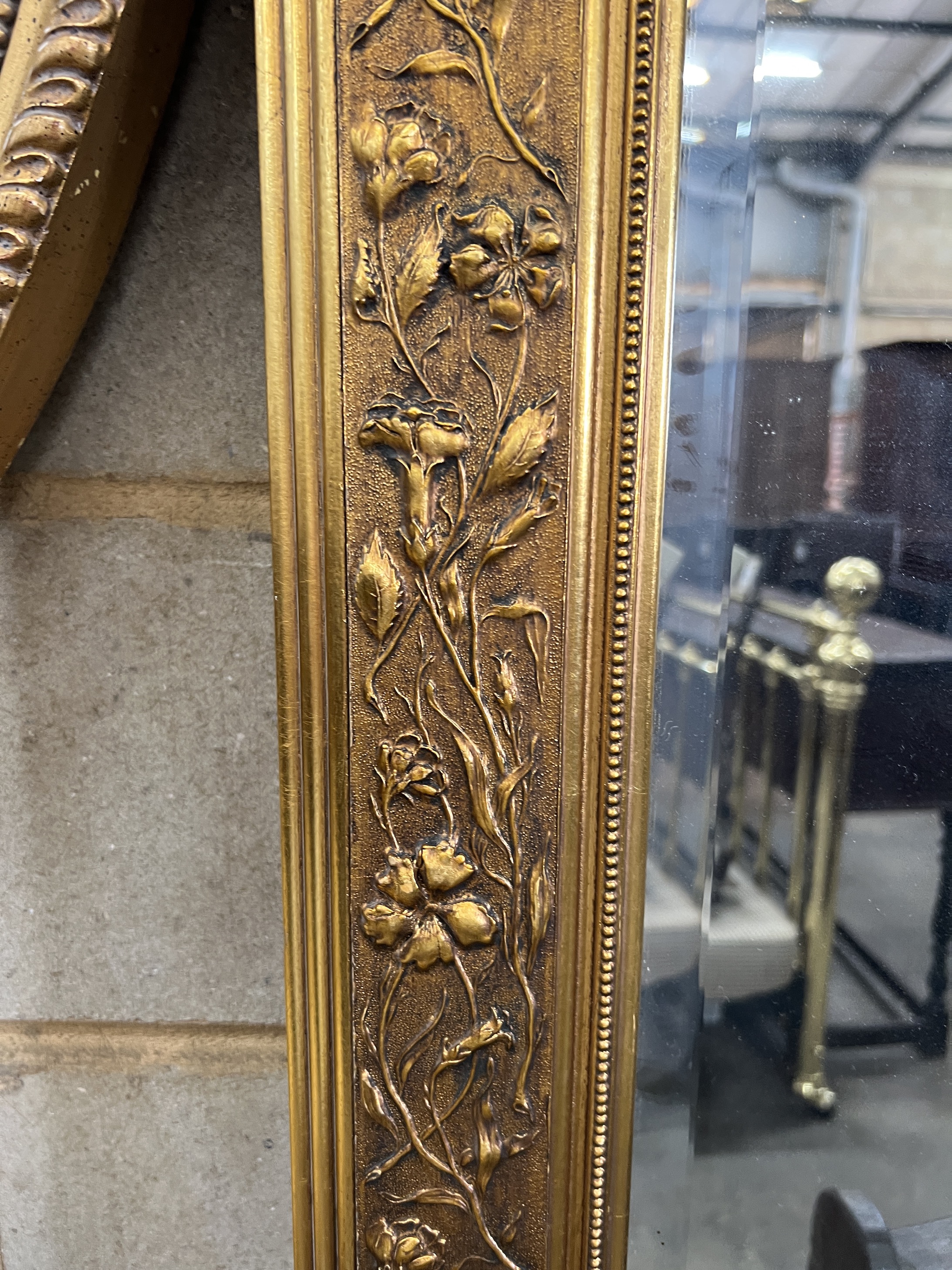 A Victorian style rectangular gilt composition wall mirror, 111cm, height 173cm